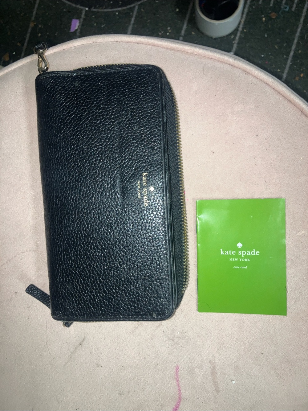 kate spade black pebbled leather zip-around wallet with gold logo